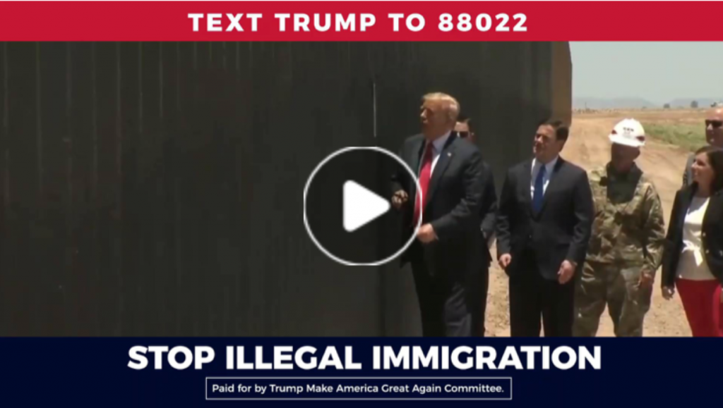 Paused video from a Trump ad. The scene shows President Trump and four other individuals inspecting the border wall. Above the scene is the following statement: "TEXT TRUMP TO 88022." Below the scene is the following statement: "STOP ILLEGAL IMMIGRATION."